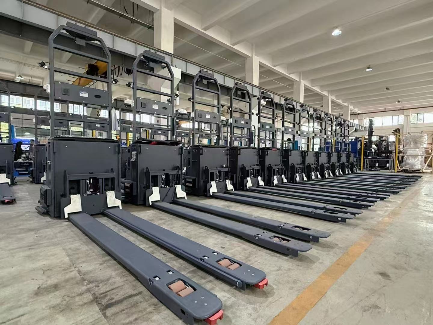 Lime green heavy duty forklift at factory yard